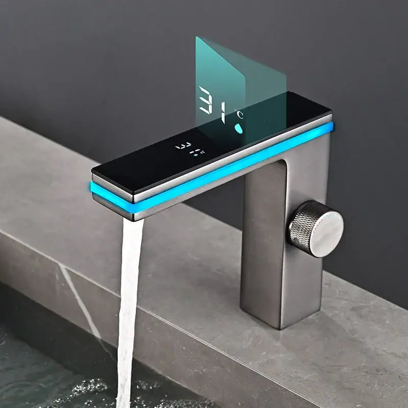Modern brushed nickel basin faucet with decorbites led temperature display and blue led lighting accents