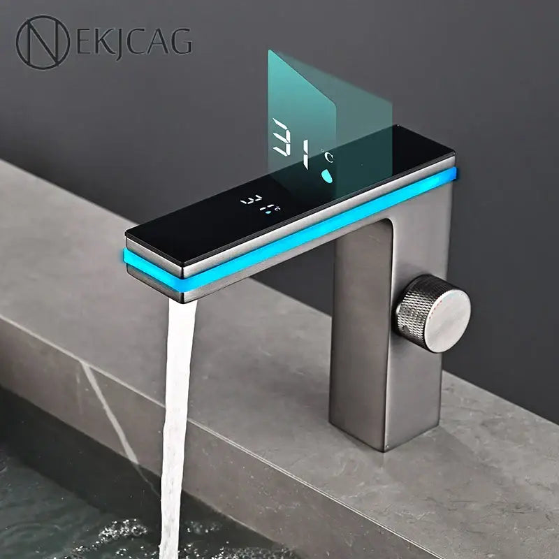 Modern matte black and brushed steel decorbites led temperature basin faucet with blue led display showing 31°c