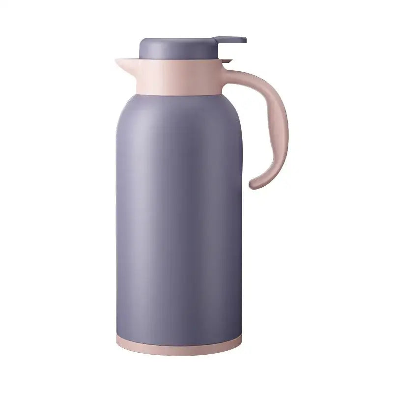 A sleek matte gray thermo bottle with soft pink handle featuring led temperature display for hot drinks by decorbites