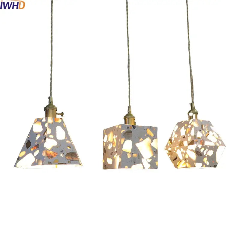 Three decorbites led terrazzo pendant lights with geometric translucent shades in white and earthy tones for Japanese style interiors