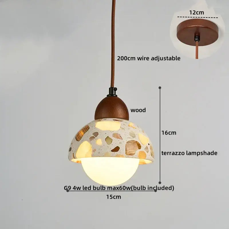 A decorbites led terrazzo pendant light with a rustic terrazzo lampshade featuring wood and stone fragments suspended from a wooden ceiling mount