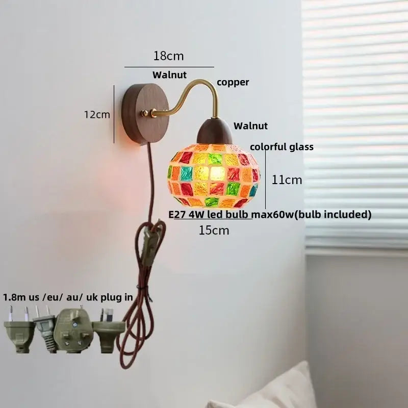 A vibrant tiffany style wall sconce with colorful glass mosaic in a walnut base and copper arm by DecorBites LED