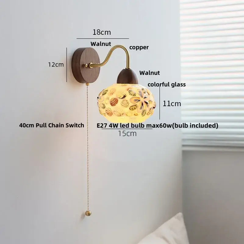 A warm-toned decorbites led tiffany style wall sconce with walnut base and colorful glass floral globe design