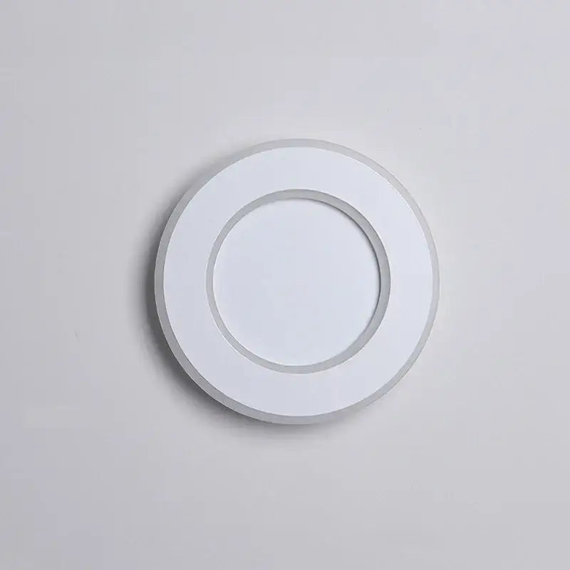 White circular recessed wall light with matte finish featuring decorbites led touch switch for modern bedroom use