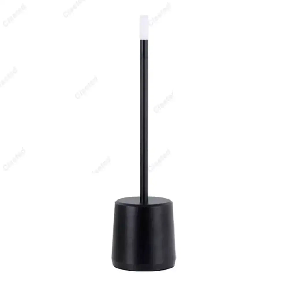 Black toilet brush with sleek cylindrical handle and white bristle head shown beside DecorBites led touch table lamp