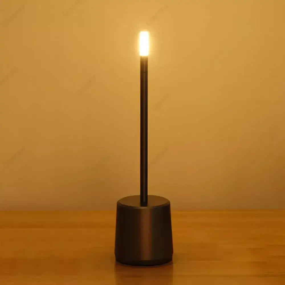 Black cylindrical decorbites led touch table lamp with warm glowing light and stepless dimming for home or hotel use