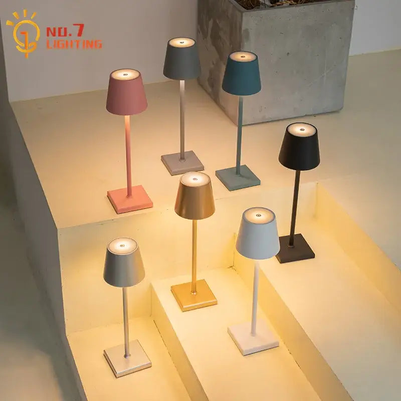 A collection of DecorBites LED touch table lamps with sleek metallic stems in pastel and neutral colors for home or office use
