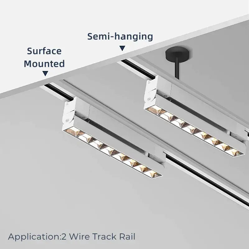 Modern white decorbites led track lamps with a minimalist design mounted on a 2-wire rail for living room lighting