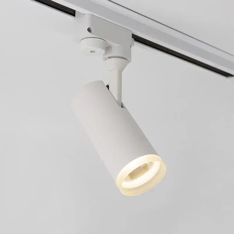 White cylindrical decorbites led track light with matte finish and warm led glow for art exhibition lighting