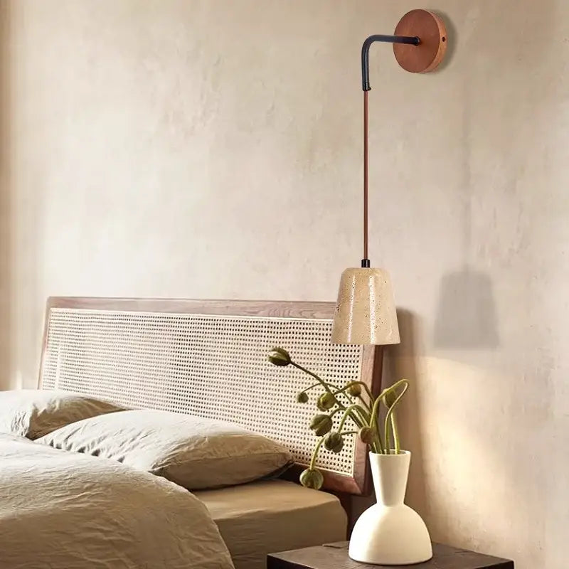 Copper-toned decorbites led travertine wall lamp with black curved arm and off-white ceramic shade for modern stair light