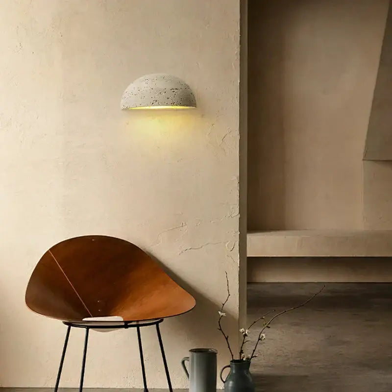 Minimalist decorbites led travertine wall light half-dome concrete sconce with warm yellow natural yellow ambiance light
