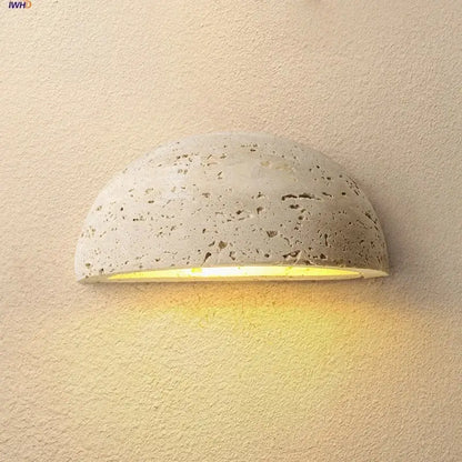 DecorBites led travertine wall light with a textured concrete half-sphere and warm yellow ambiance for porch and study