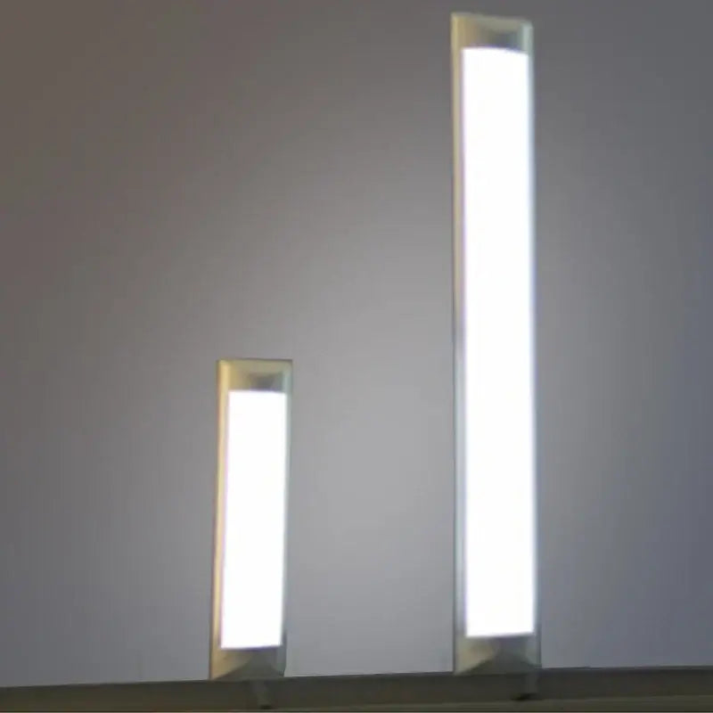 Two sleek rectangular decorbites led light batten tubes with metallic frames for energy-efficient ceiling lighting