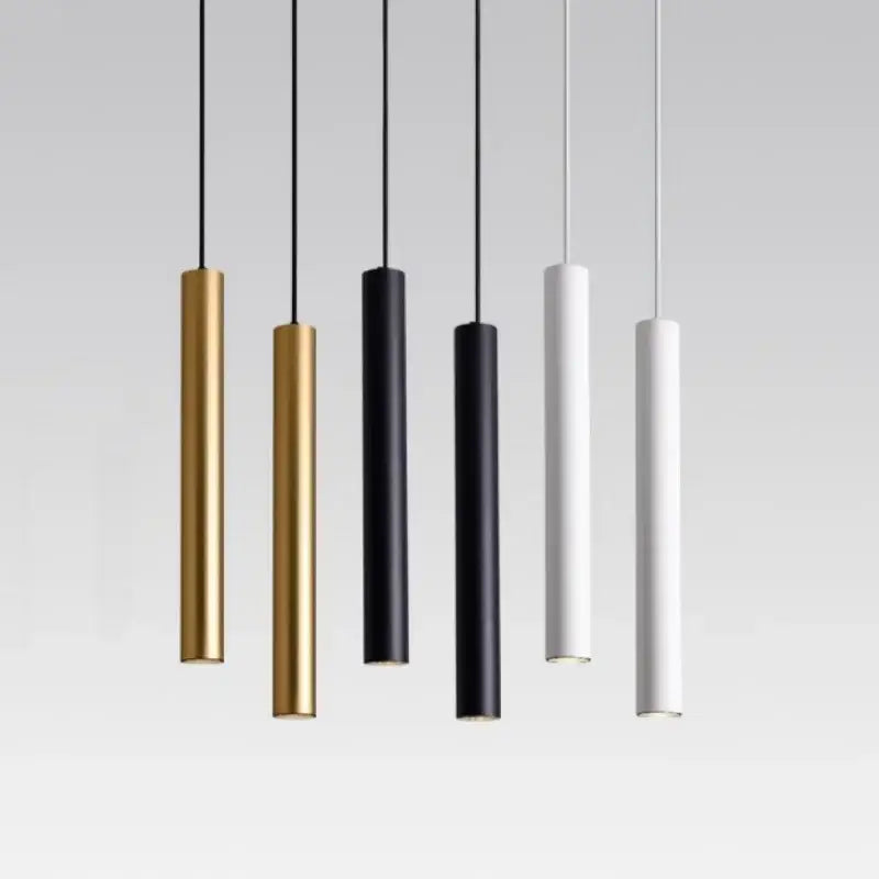 Minimalist cylindrical pendant light collection in gold black and white finishes from decorbites led tube pendant series