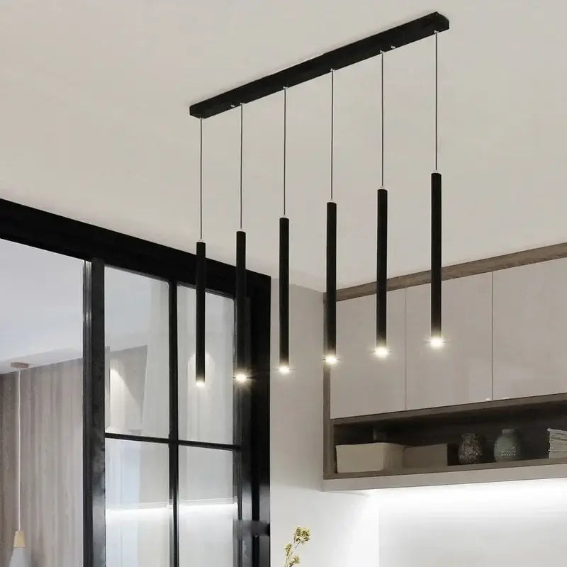 Modern black cylindrical DecorBites LED tube pendant light with minimalist design for dining room kitchen or bar lighting