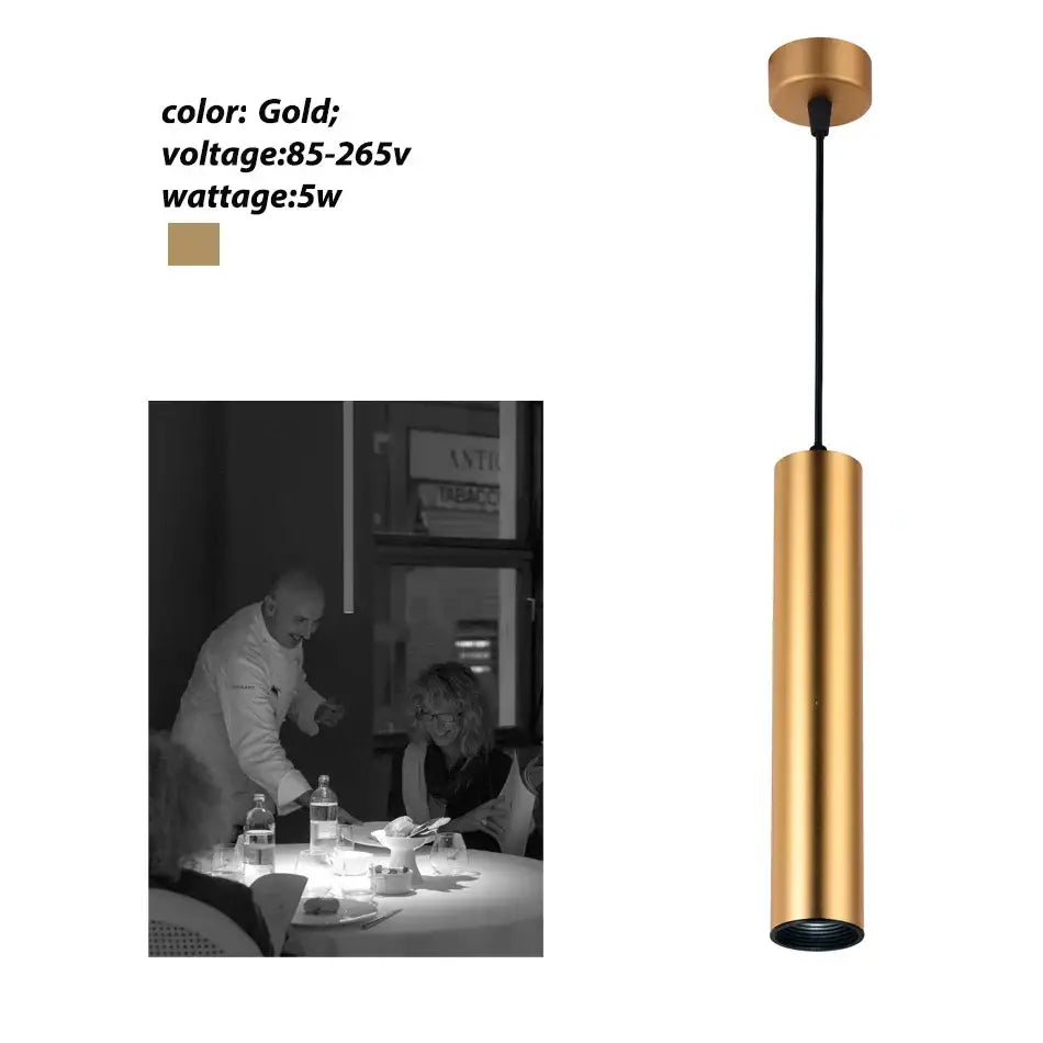 Gold cylindrical pendant light with sleek metallic finish and black cord decorbites led tube pendant for kitchen dining