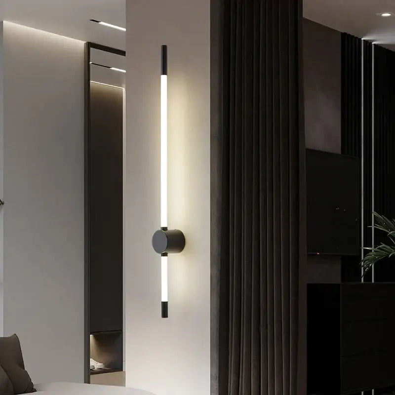 Modern minimalist decorbites led tube wall light with sleek black base and slender white led tube for bedroom and living room