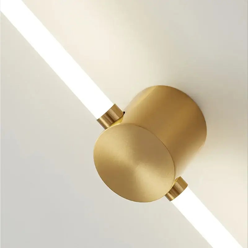Modern gold-toned decorbites led tube wall cylindrical light fixture with two sleek angled led strips for elegant lighting