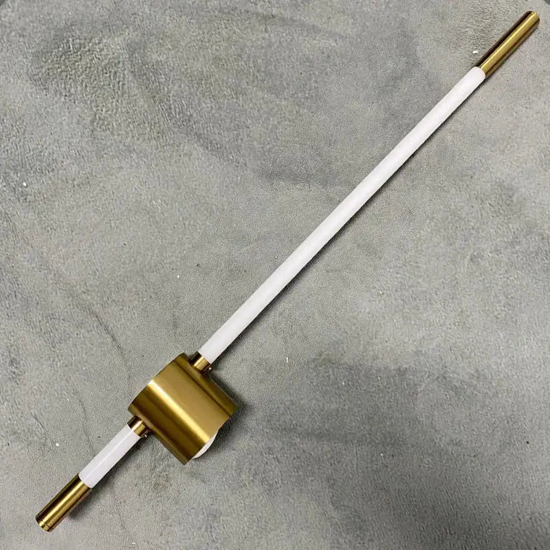 Decorbites led tube wall light with sleek white ceramic rod and gold-toned metal caps for elegant indoor lighting