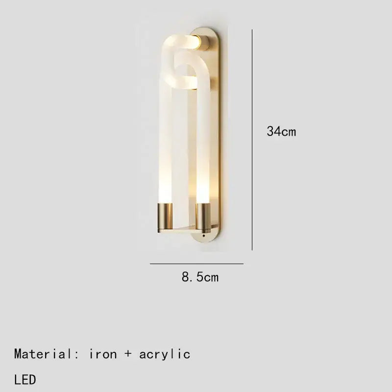 Modern decorbites led tube wall sconce with brushed brass iron frame and curved acrylic diffuser in gold and white metal