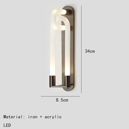 Modern minimalist DecorBites LED tube wall sconce with sleek curved acrylic diffuser and brushed iron gold black white frame