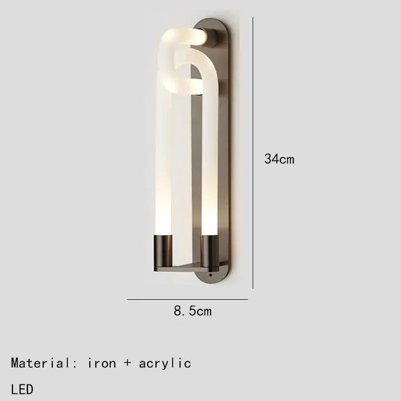 Modern minimalist DecorBites LED tube wall sconce with sleek curved acrylic diffuser and brushed iron gold black white frame