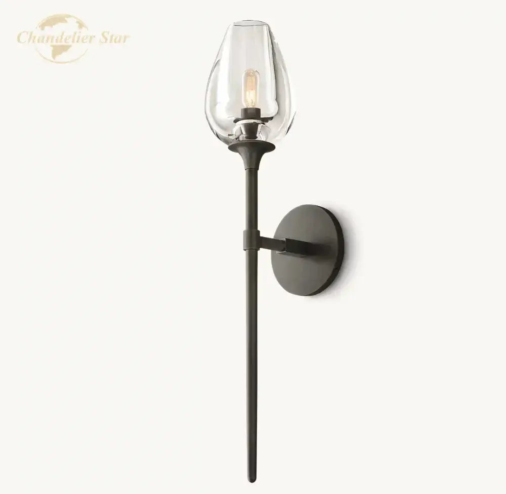 Black metal wall sconce with clear glass shade and exposed filament bulb by decorbites led tulip for indoor lighting