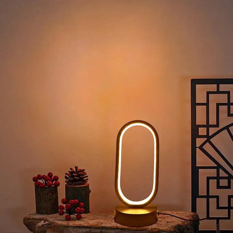 Gold oval-shaped led lamp bedroom bedside decorative lamp with glowing ring for living room and study lighting