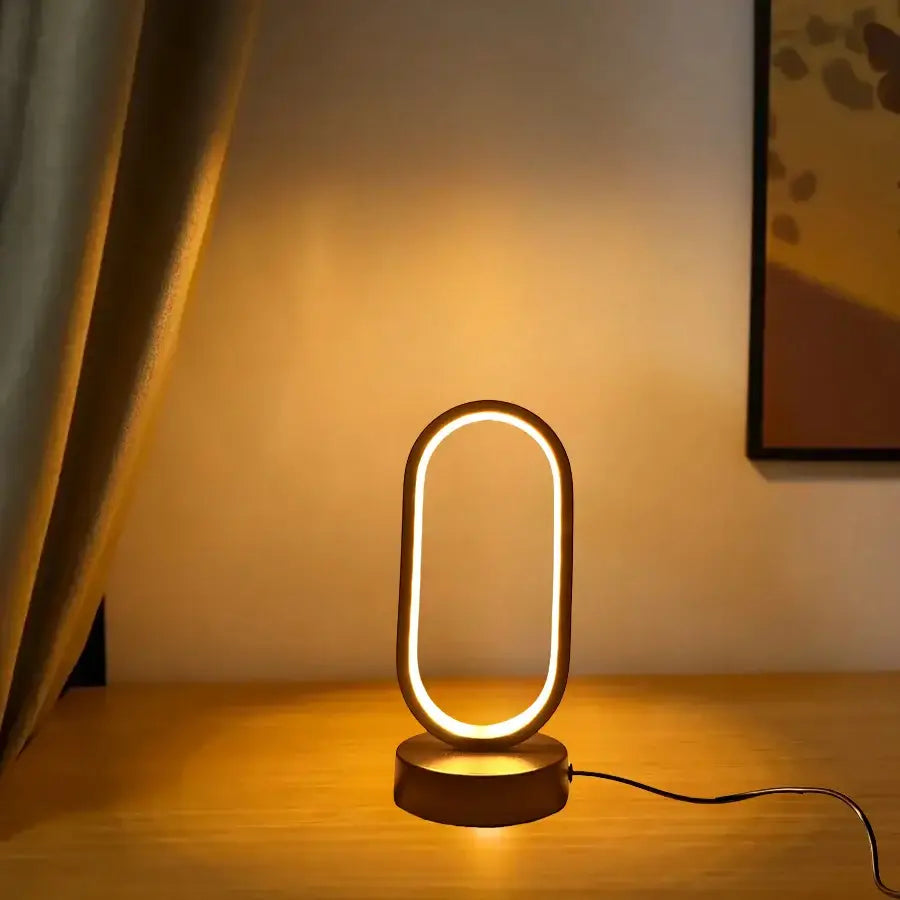 Decorbites led u-shaped bedroom bedside decorative lamp with sleek metallic finish and warm golden glow for study lighting