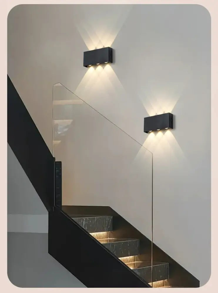 Black rectangular decorbites™ led wall sconce battery operated with sleek design for modern led wall lighting solutions