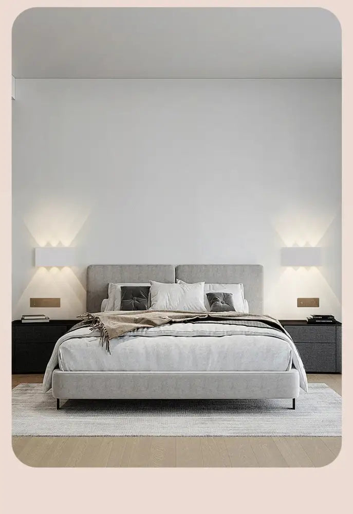 Modern bedroom featuring decorbites™ led wall sconce battery operated with sleek design and warm lighting