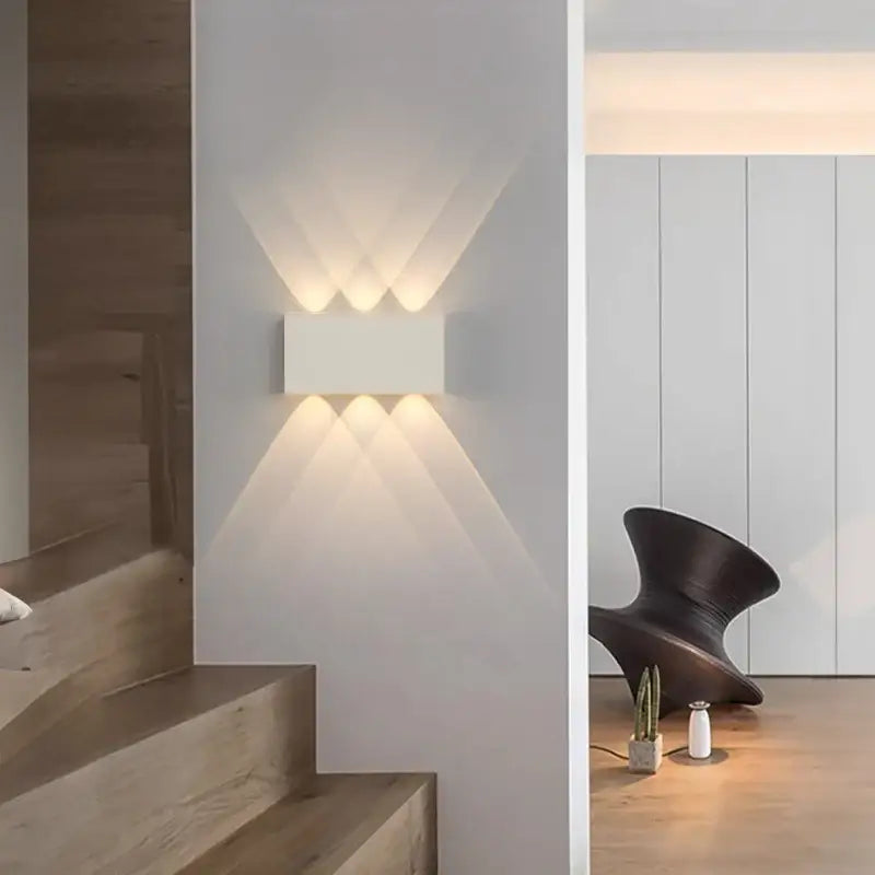 Rectangular DecorBites™ led wall sconce with six light beams battery operated for modern indoor lighting