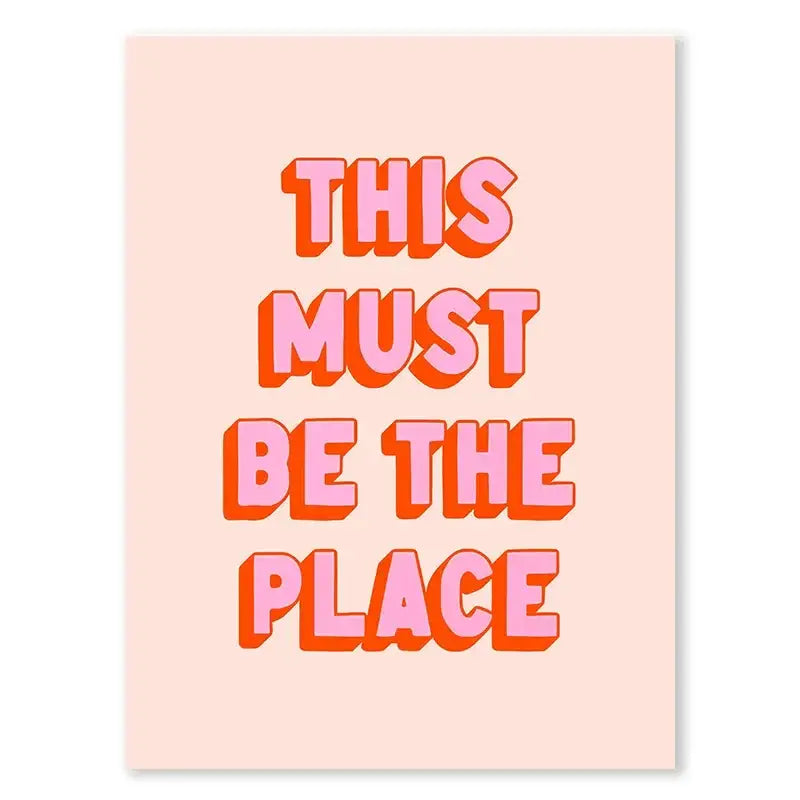 Pastel pink decorbites™ leopard color block abstract canvas wall art with bold coral-orange text this must be the place