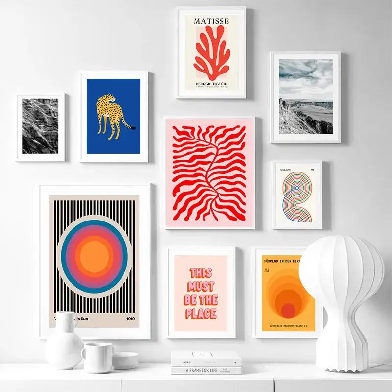 White pleated lamp with modern sculptural design paired with decorbites leopard color block abstract canvas wall art