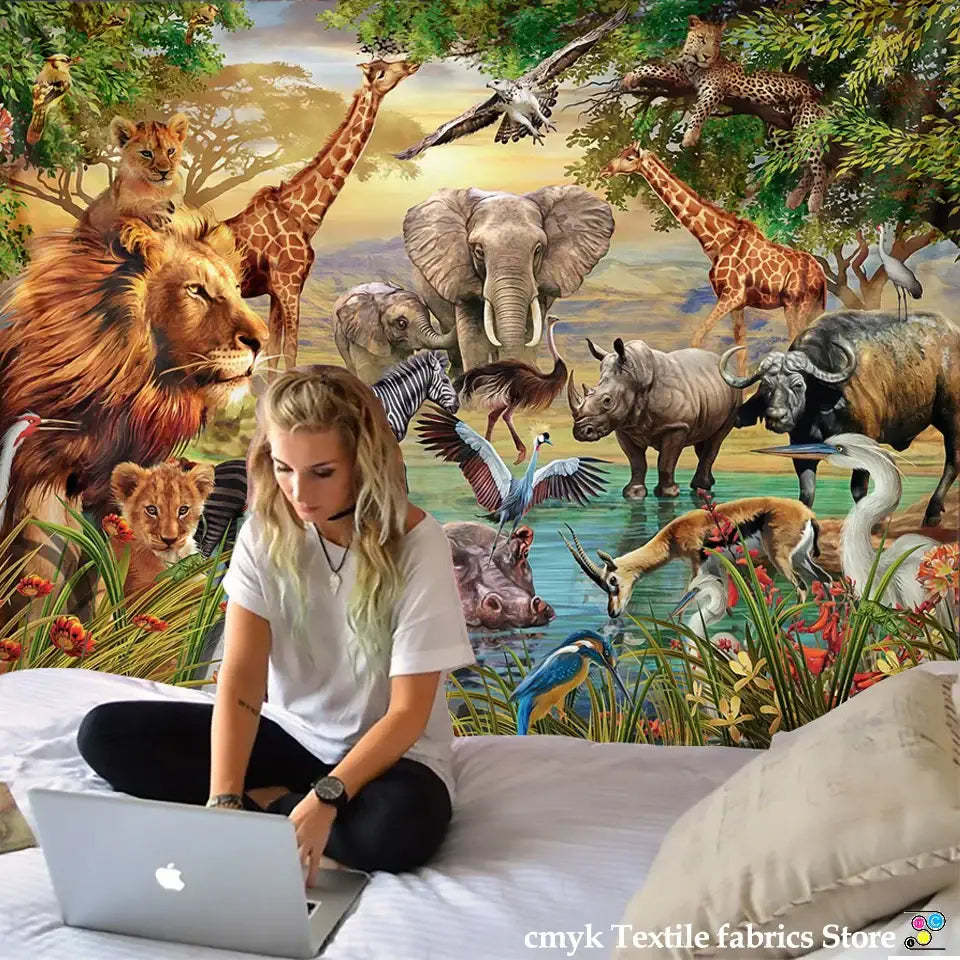 Silver apple laptop with decorbites lion tapestry silver grassland animal wall hanging in bedroom setting