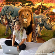 Silver apple laptop displayed with decorbites lion tapestry featuring silver grassland animal wall hanging for bedroom