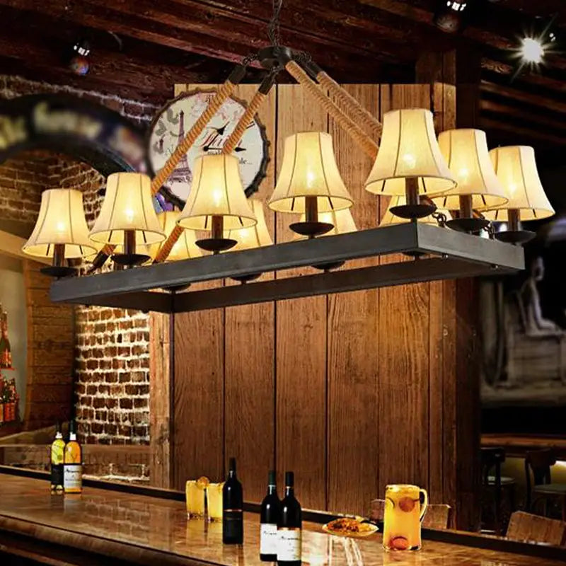 Industrial-style fabric island lamp with loft style black iron rectangle frame, rope accents, and cream lampshades for restaurants