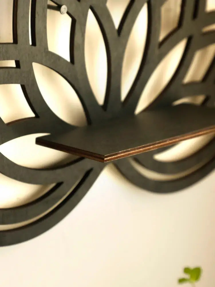 Black laser-cut wooden lotus floating wall shelf with petal design by DecorBites™ for multi-style home decor