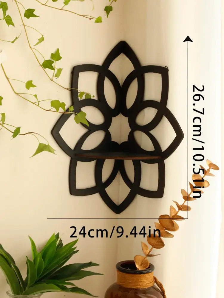 Black metal lotus floating wall shelf with floral cutout design and wooden shelf for multi-style home decor