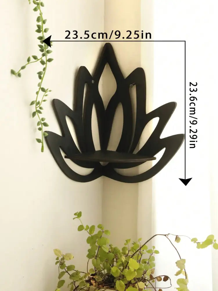 Black metal decorbites™ lotus floating wall shelf with a flat central platform for versatile home display