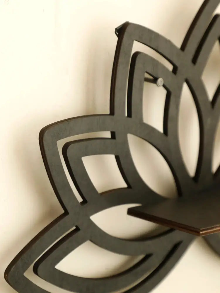 Black laser-cut wooden lotus floating wall shelf with layered petal design by DecorBites™ for multi-style home decor