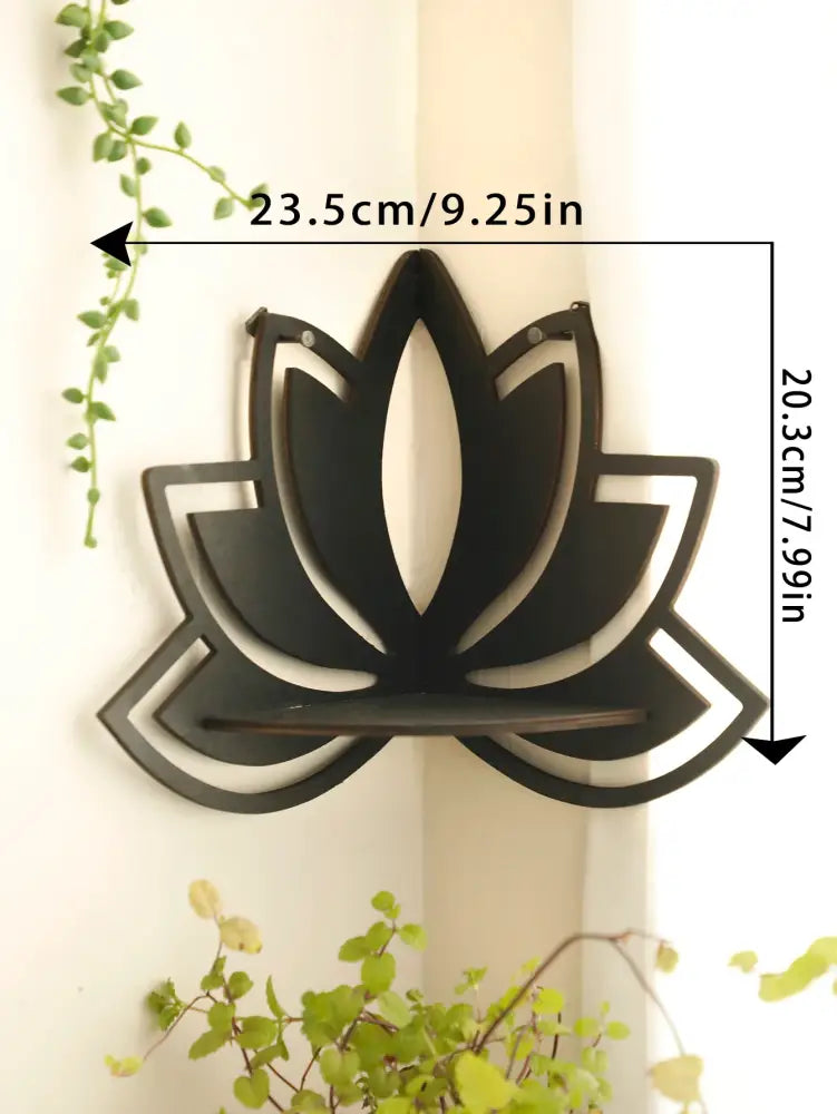 Black metal lotus floating wall shelf with central horizontal platform for multi-style home decor by decorbites