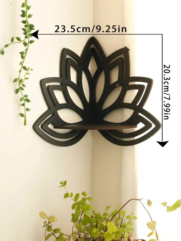 Black metal lotus floating wall shelf with central wooden slat for multi-style home decor by decorbites