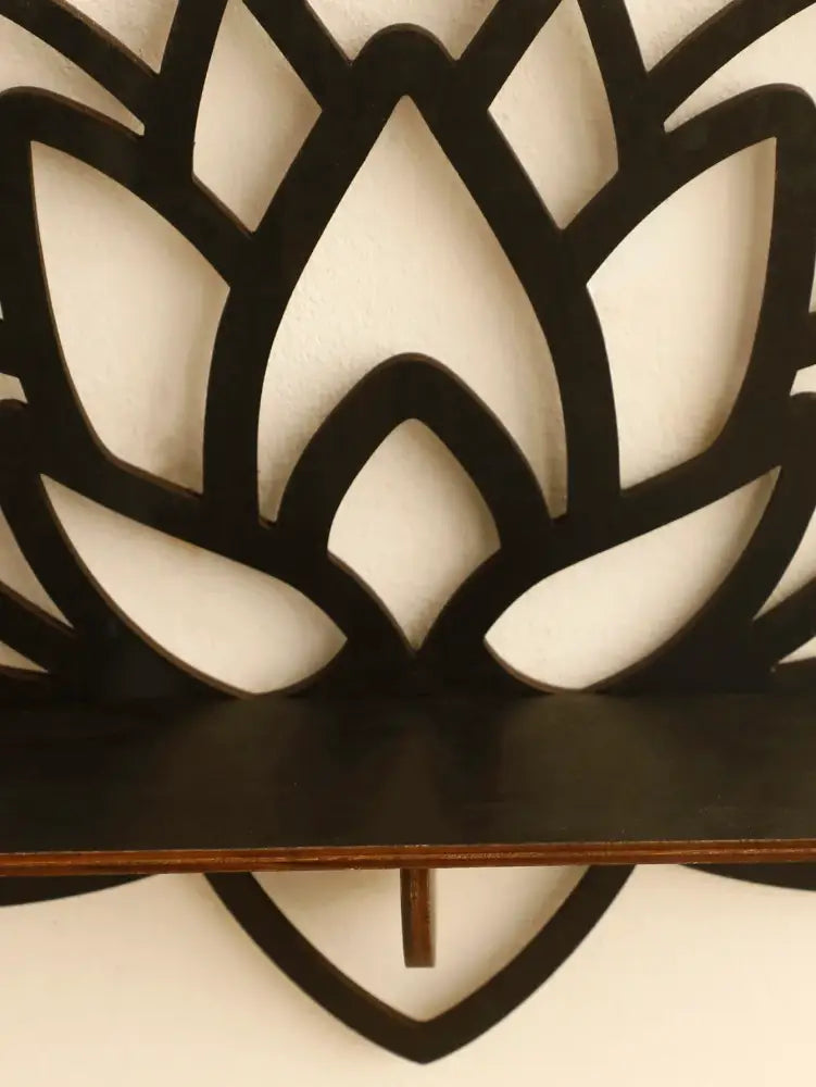 Black laser-cut wooden lotus floating wall shelf with openwork pattern from DecorBites™ multi-style home decor