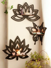 Black metal lotus floating wall shelf with cutout designs and wooden slats for multi-style home decor by DecorBites