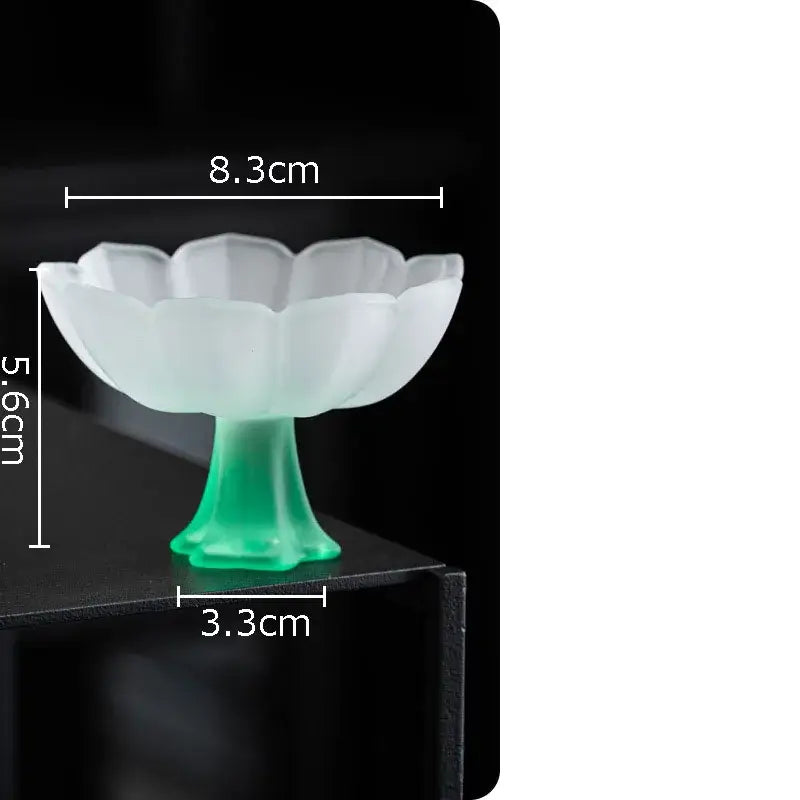 A translucent white and green lotus flower glass dessert bowl with a petal design from decorbites lotus flower set