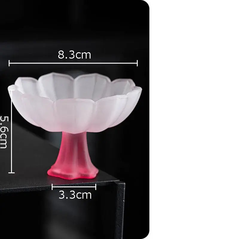 A translucent white and pink lotus flower glass dessert bowl with petal-shaped rim and pedestal base by decorbites lotus flower
