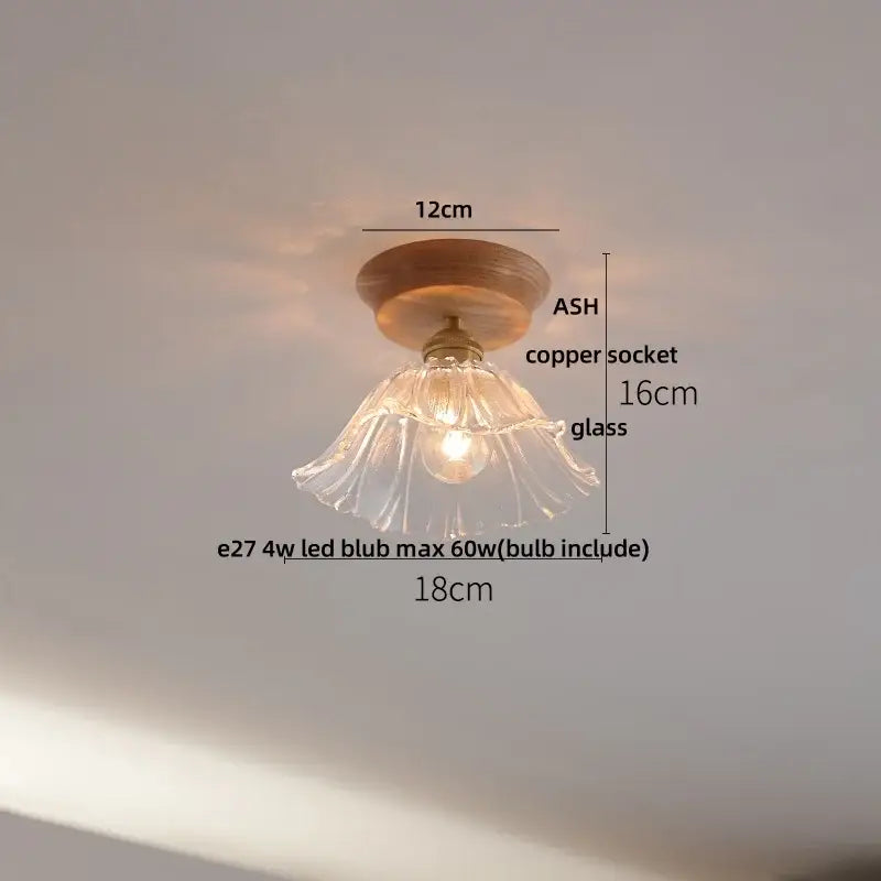 DecorBites lotus glass led ceiling light with a clear fluted glass pendant and warm wooden ceiling mount in copper base