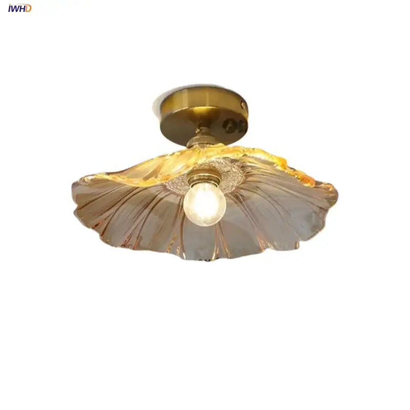 DecorBites lotus glass led ceiling light with golden copper base and translucent amber seashell-shaped glass shade