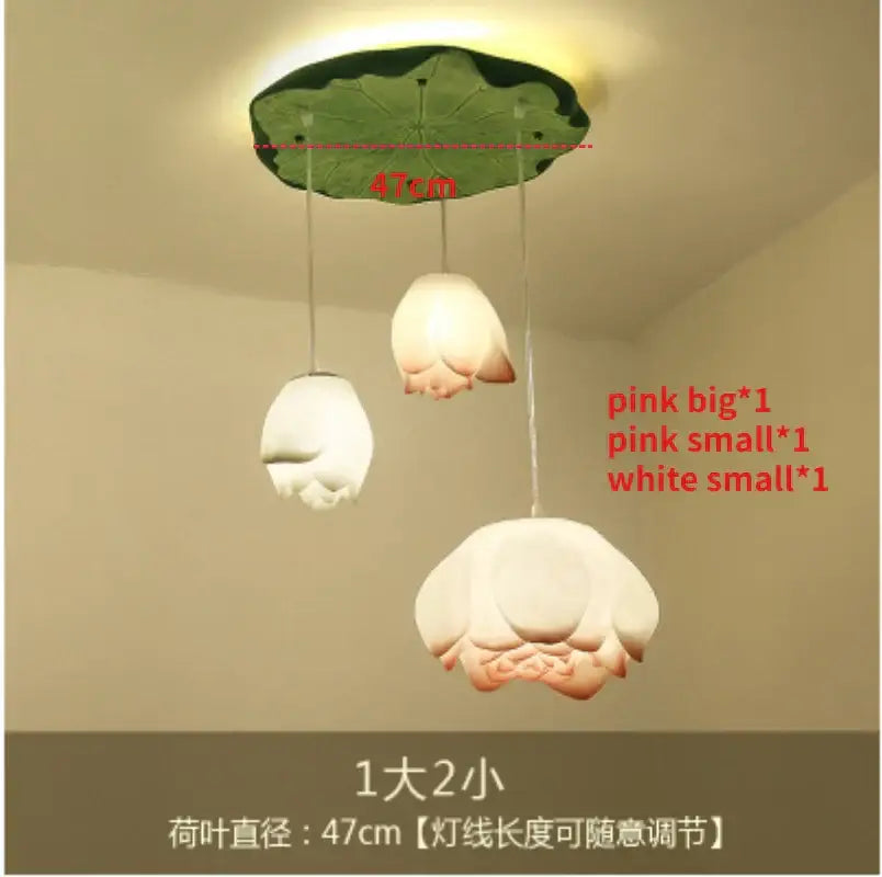 A decorbites lotus glass pendant lamp with a green leaf base and three pink and white blooming flower glass lights